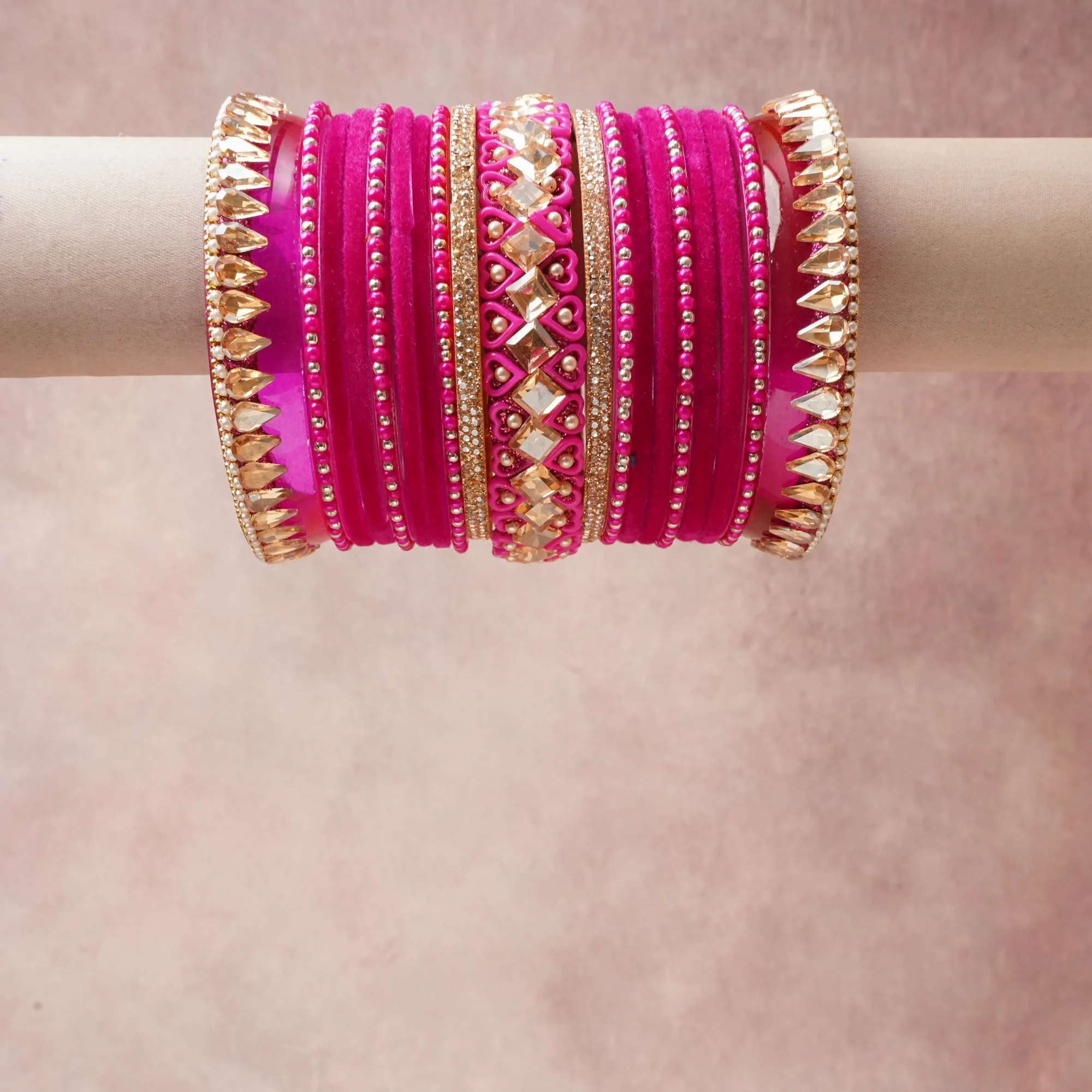 A majestic Fuchsia set, complemented by Gold, Clear, Champagne featuring Velvet, Resin, Metal Alloy, Crystal, Synthetic Pearl.
Rich, ceremonial, and designed to be passed through generations.